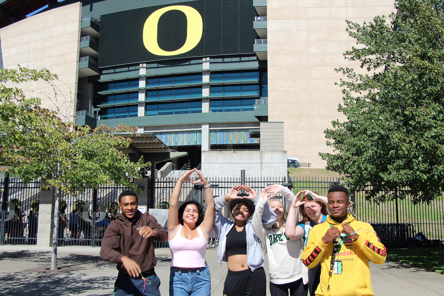 2023 NSFR Students put up an "O' in from of Autzen Stadium