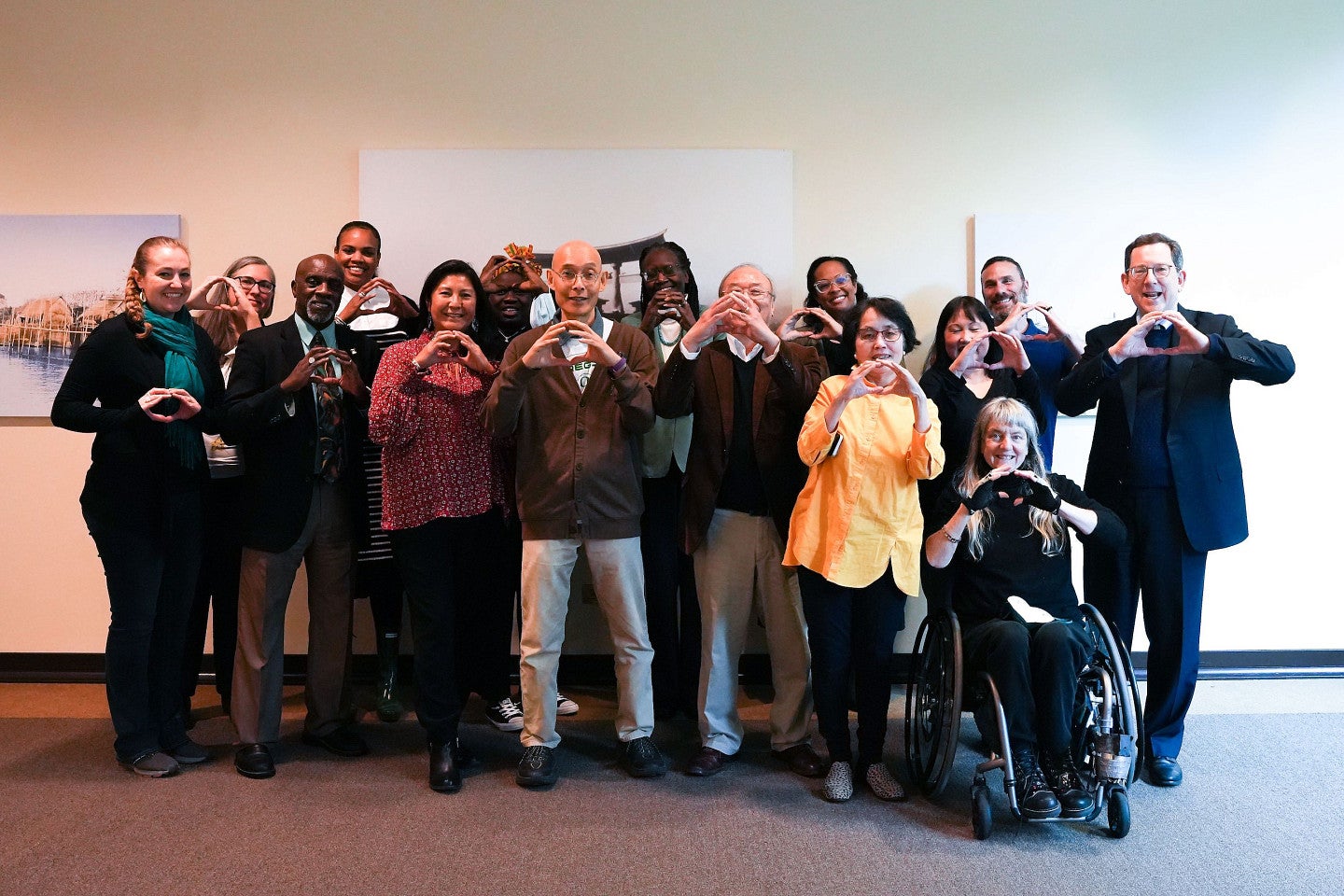 PDACC members and guests in group shot making the UO "O"