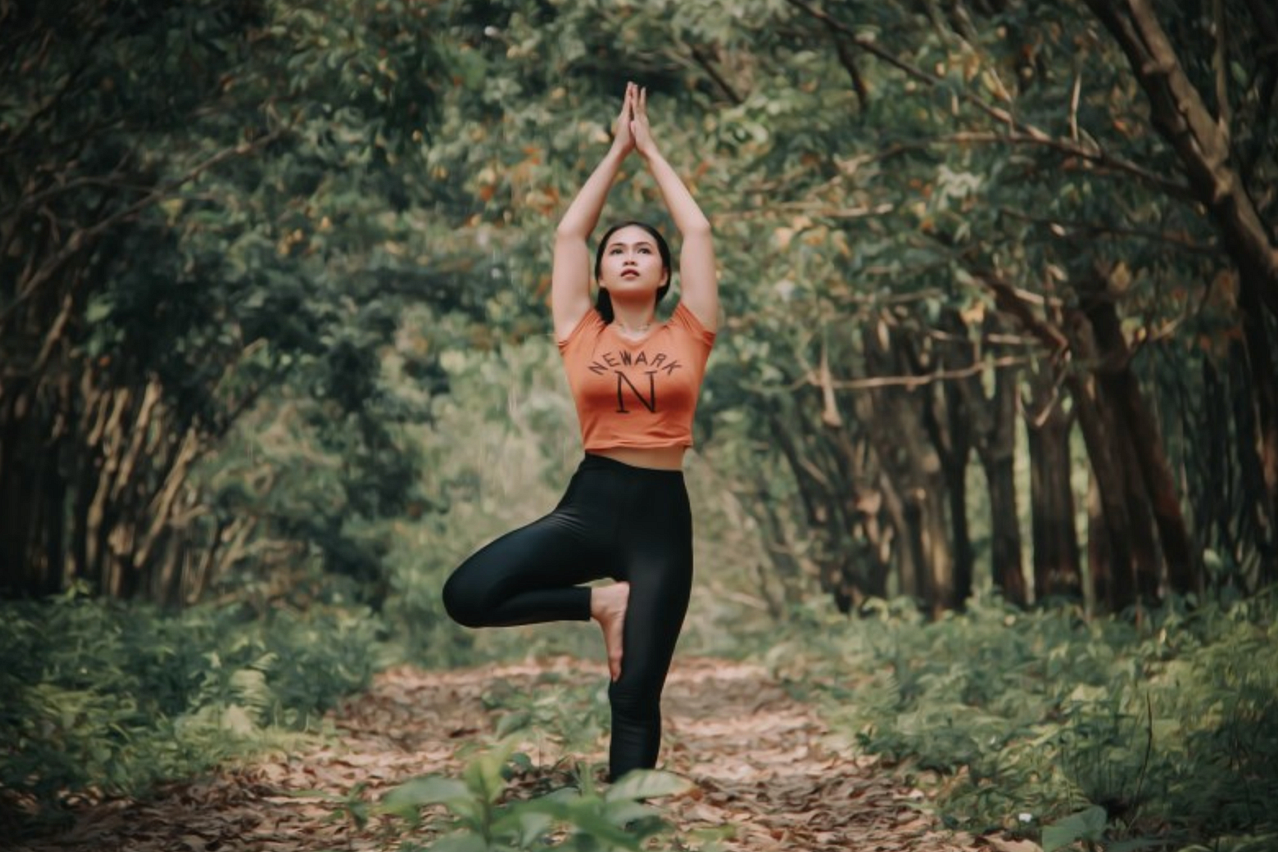 Women doing yoga in nature.