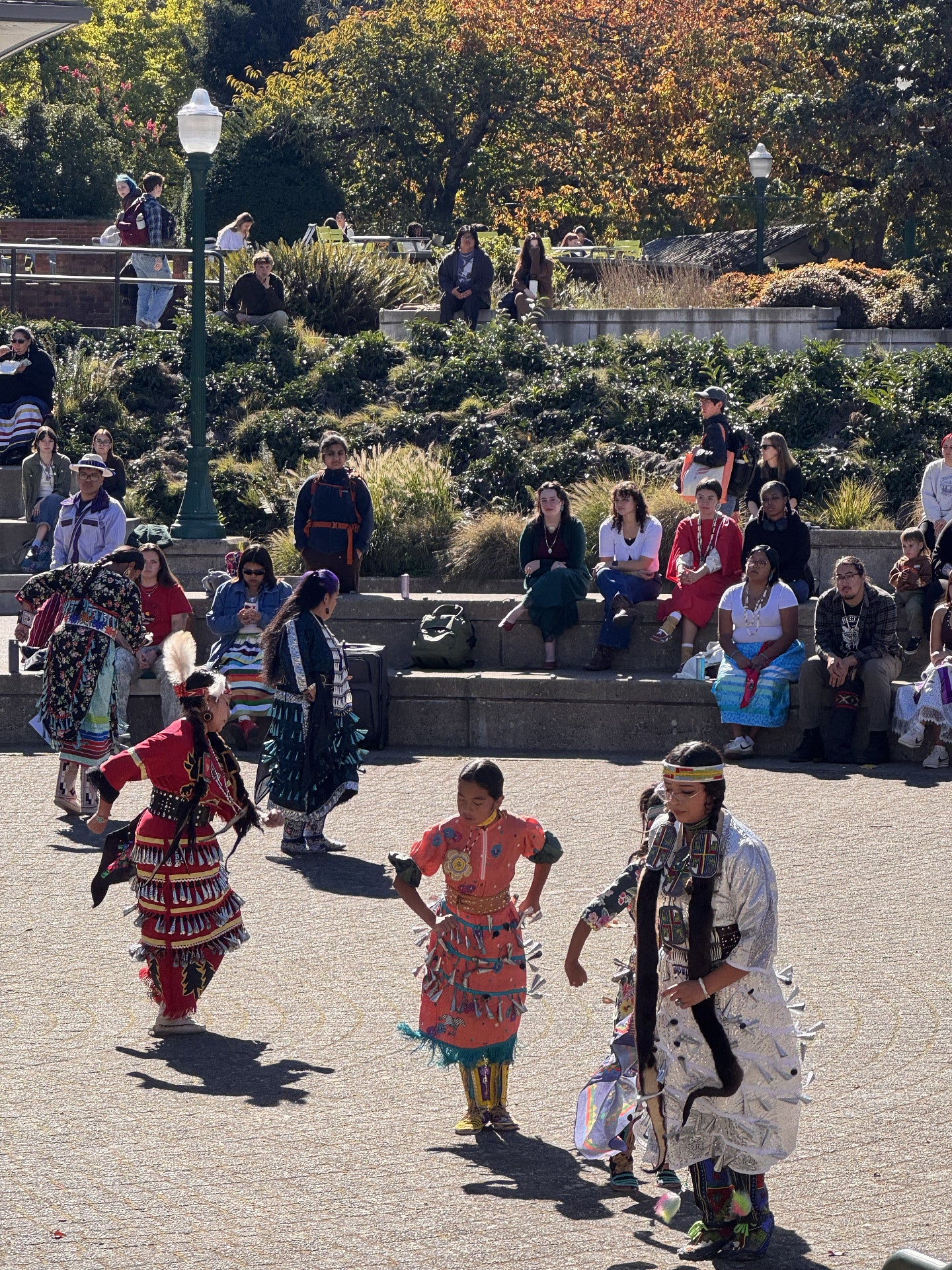 People gathered outside of the EMU celebrating Native American Heritage