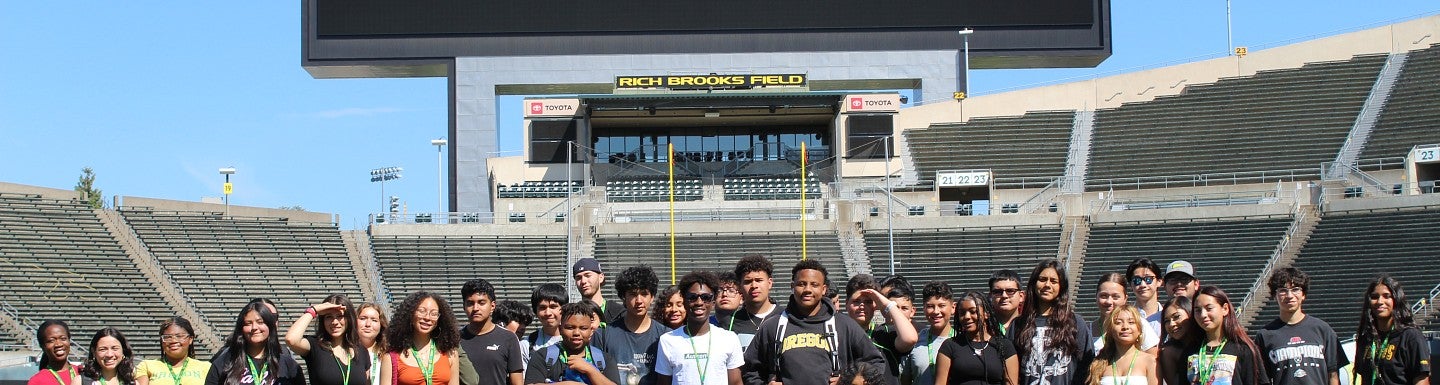 Image of 2024 NSFR Students posing on Autzen field.