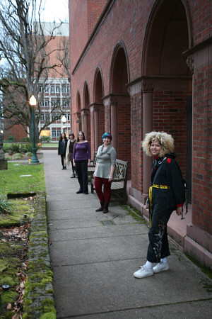 four students hanging out in a UO building 