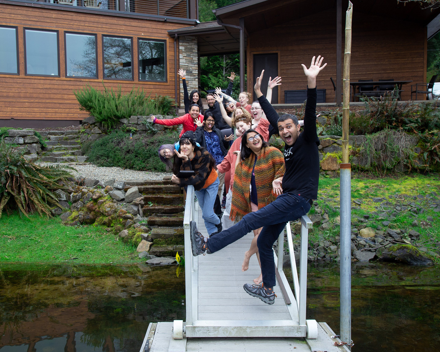 Rehearsals for Life students on their retreat, jumping into the air with smiles