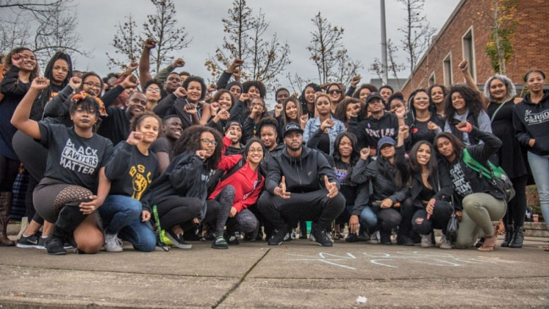 Black students in group shot at Black student rally