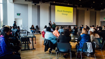 Black Strategies Group presentation in an auditorium