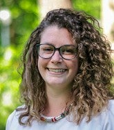 Celena Simpson headshot outside grassy background