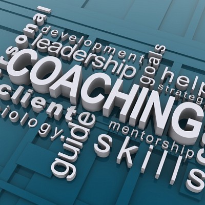 writing coach in white letters blue background with other related words designed on clip art